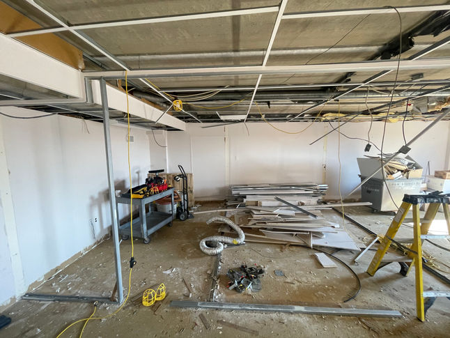 Picture of a gutted space at a pediatrician facility before renovations are done by PRM services.