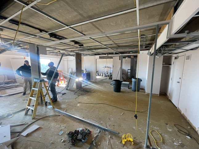 Picture of a gutted space at a pediatrician facility before renovations are done by PRM services.