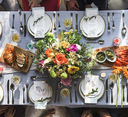 Elegant wedding tablescape featuring beautiful floral arrangements, fine china, and sophisticated table settings, showcasing Goodrich Gourmet Catering Company's Richmond wedding packages. Offering exquisite menus, elegant presentations, and seamless service for your special day, with customizable options for buffet, plated, or family-style dining starting at $39.99 per guest.