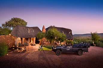 The lodge offers 3 different types of accommodation:
Lelapa (meaning "family")
Dithaba (meaning "mountain")
Kopano (meaning "small gathering")
All are set overlooking the hills and plains of the malaria-free Madikwe game reserve. Each "lodge" has its own lounge and dining area, giving you the exclusive feel of a lodge within a lodge. African artwork, traditional lamps and artefacts give a real authentic sense of the bush. The rooms are in thatched villas have a private deck with outdoor shower, plunge pool and views across the reserve. Wood-burning fireplaces for cool nights, air conditioning and ceiling fans for when it's hot.
Rooms at Dithaba Lodge are set further up the mountains and have some of the best views over the plains, while those at Kopano Lodge have a more private, exclusive feel.
Meanwhile, Lelapa Lodge offers family rooms.
Activities include Game drive, Game Walks & Bird Watching