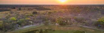 An intimate owner-managed camp which is located in the southern section of Kafue National Park. It has a mix of safari tents and chalets, both en suite. You can get to the camp by road from either Livingstone or Lusaka and the journey takes around 3.5 hours.
Activities include game drives and walks, waterhole viewing and the all-important sundowners! All over the 5 tents and chalets have beautiful views and gauzed windows allow you to fall asleep to the sounds of the African bush. The tents and chalets sit along the tree line giving uninterrupted views and the chance to absorb the peace and tranquillity of the wild. 3 of the tents can sleep up to six people and all have their bathroom with solar-powered lights and hot water.
The game viewing experience is excellent with many visitors reporting sightings of 12 different antelope species on a 3-night stay. There are also elephants, lions, cheetahs and wild dogs. You might be fortunate to spot the elusive leopard. Hippos and buffalos are usually seen further north around Lake Itezhi-tehzhi. The camp welcomes families with children 12 years and over as this is the minimum age for walking safaris in Zambia.