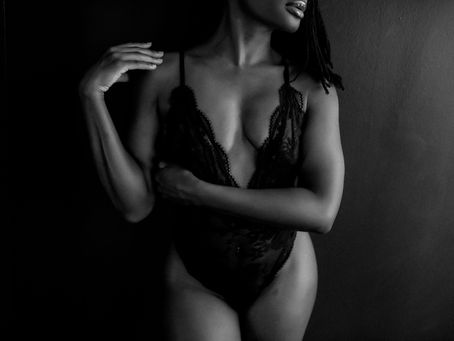 black and white of a woman in black lingerie