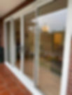 White triple track sliding patio door