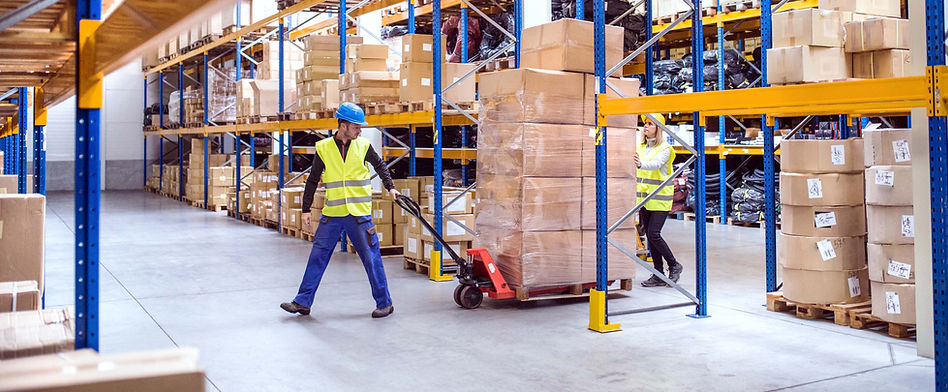 warehouse-workers-pulling-a-pallet-truck-2021-08-26-12-07-53-utc (2).jpg