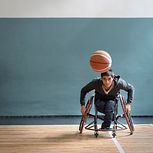 full-shot-man-wheelchair-playing-game.jpg
