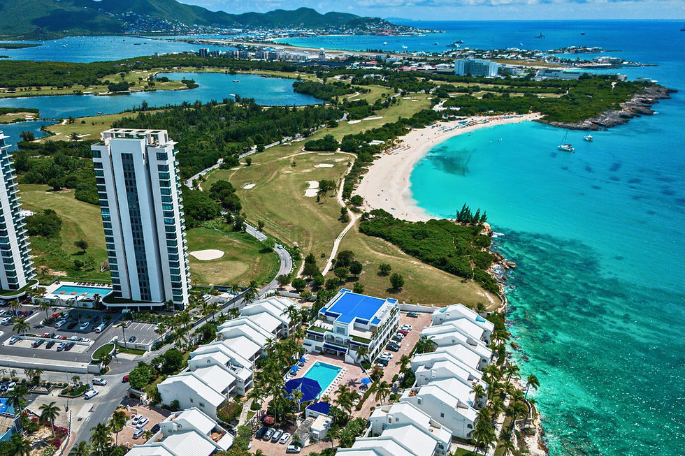 Aerial view of condo residences, the golf course and Mullet Bay beach in Cupecoy, Sint Maarten