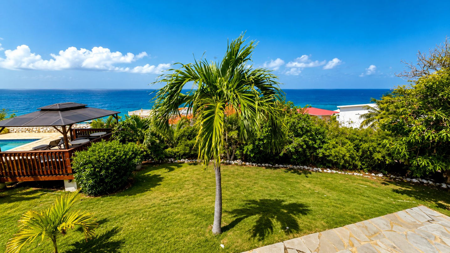 Luxury home garden, gazebo and swimming pool with breathtaking ocean views in St. Maarten
