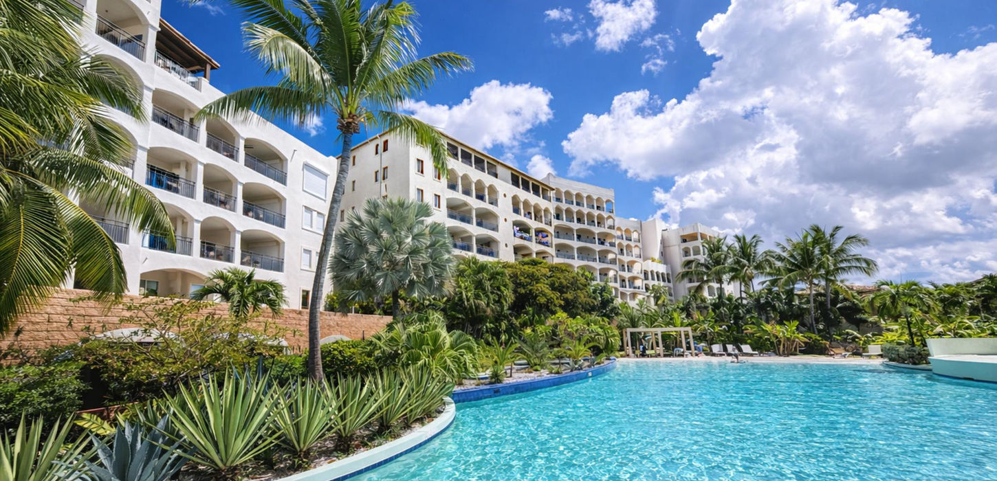 Resort-style swimming pool with tropical gardens in Sint Maarten condo for sale