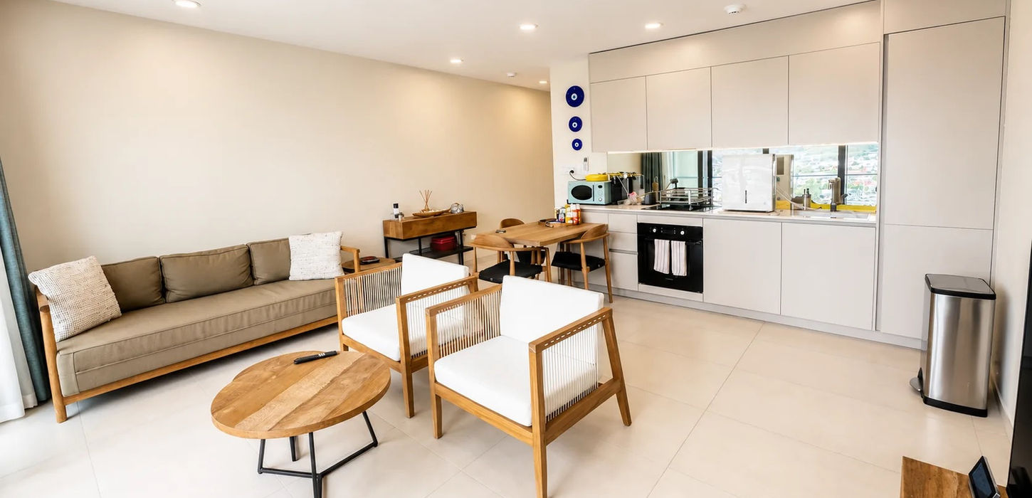 Open-concept kitchen and living area in a modern luxury apartment for sale in Sint Maarten with premium finishes and spacious layout.