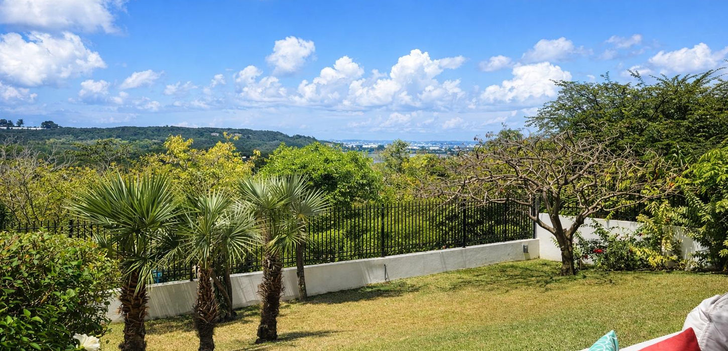 Patio with seating condo for sale Maho St Maarten with garden view