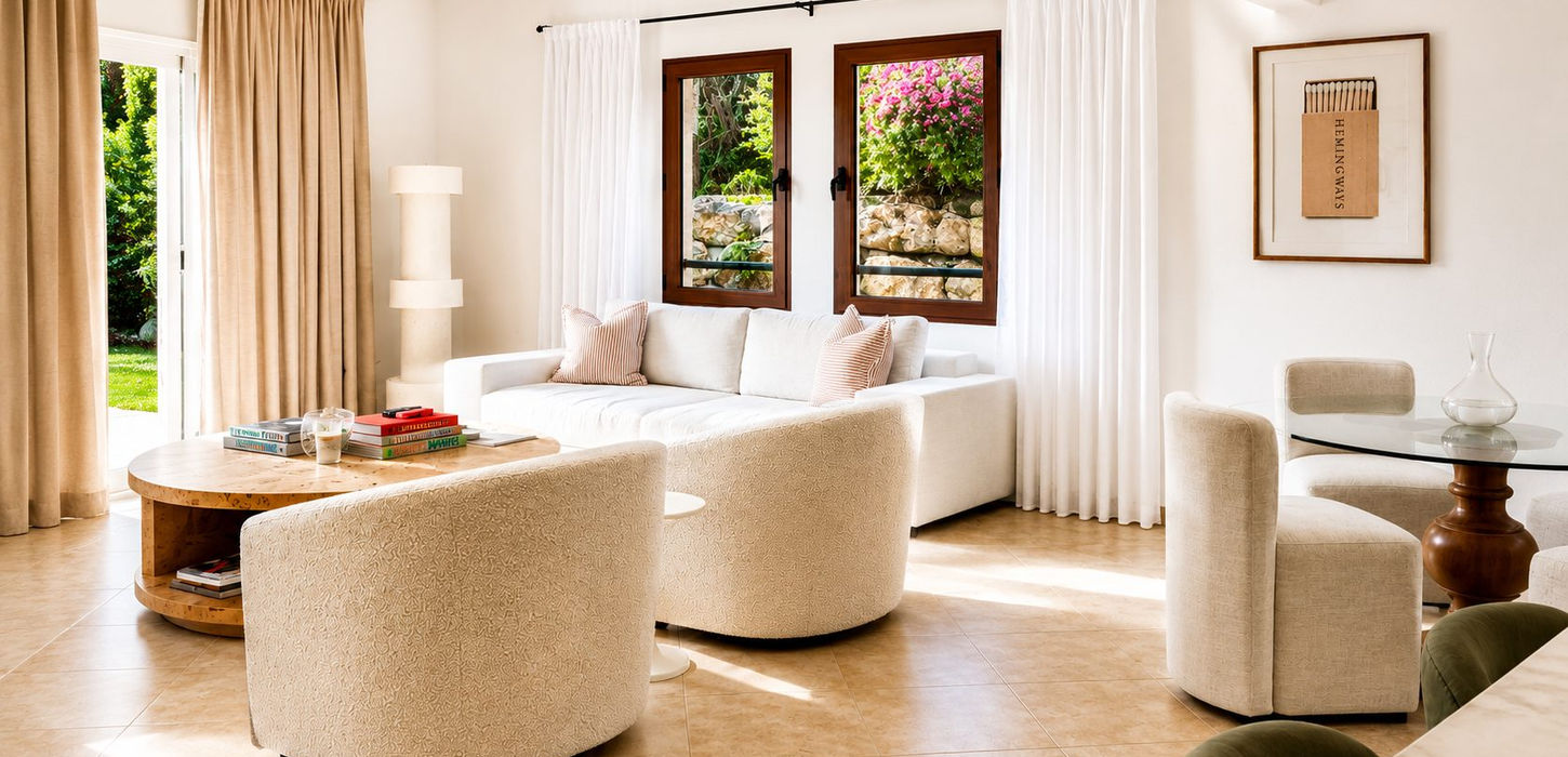 Elegant dining area with garden views in luxury Porto Cupecoy condominium for sale in Sint Maarten