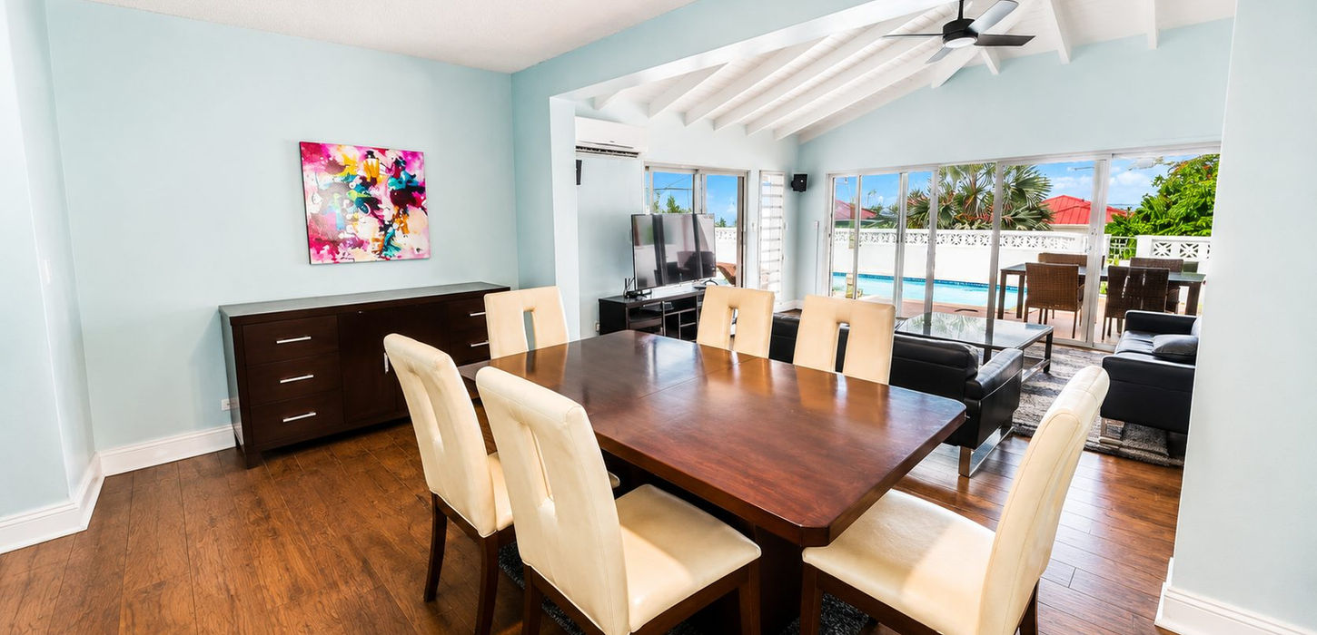 Pelican Key luxury living room with vaulted ceiling and open concept design in Sint Maarten real estate