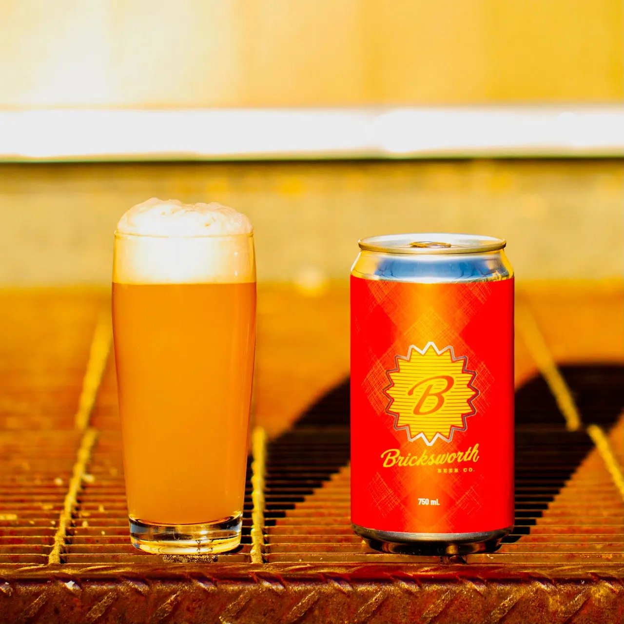 image of a medium golden beer next to a Bricksworth beer Co. can