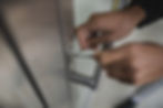 Locksmith unlocking a door using professional tools in Sydney