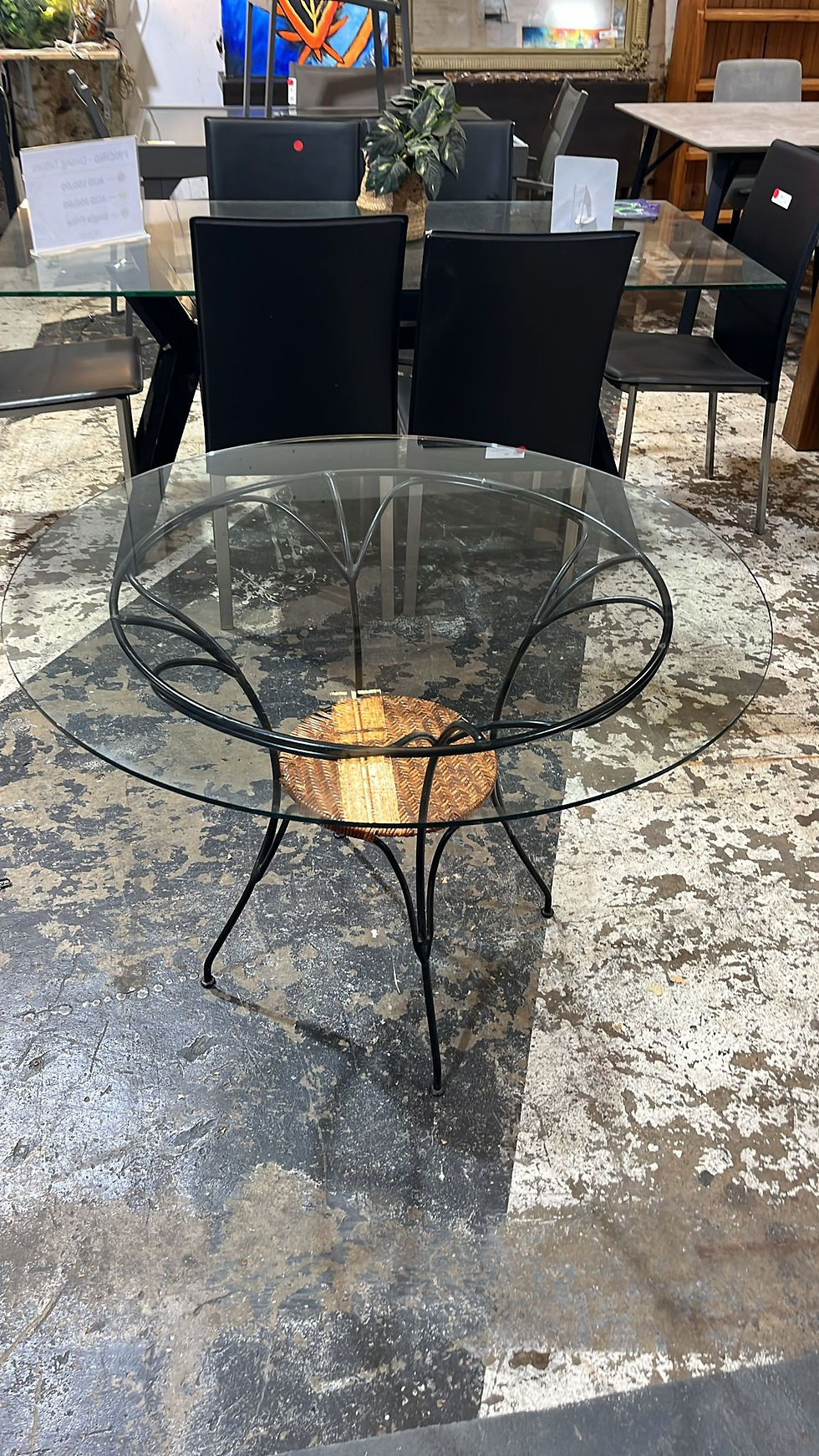 Thumbnail: Round Glass Dining Table with Metal Frame