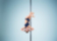 strong-graceful-young-girl-performing-acrobatic-exercises-pylon (1).jpg