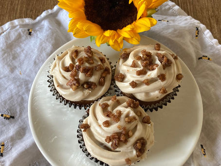 Spiced Pumpkin Cupcakes with Cream Cheese Frosting and Candied Pecans