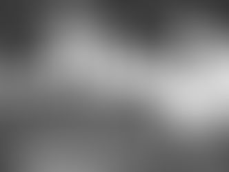 Four silhouetted workers stand near steaming hot metal patterns in a dark industrial setting, creating a dramatic and intense atmosphere.