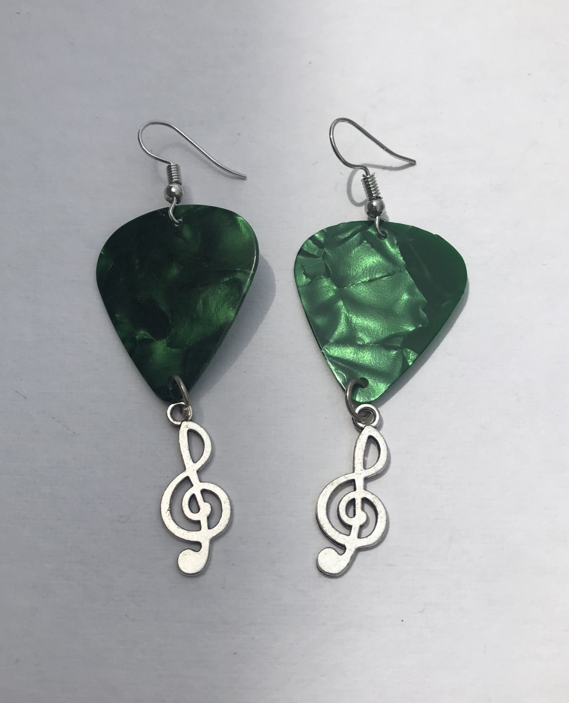 Metallic green guitar pick earrings
