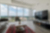 Glass-Wall Penthouse: Luxury Living with Panoramic Views