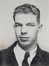 Black-and -white portrait of Brandon's Grand Uncle Robert Heath, around age 18, wearing a tie and jacket.