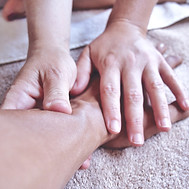 persons hand on persons lap_edited.jpg