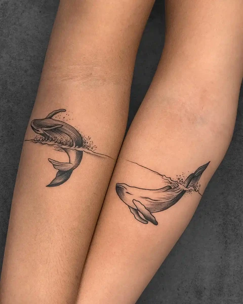 small whale couple tattoo