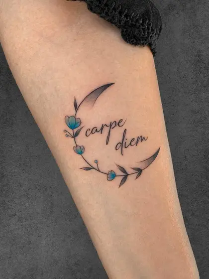 "Simple yet profound, this piece embodies the spirit of ‘seize the day.’ The delicate floral embellishments and soft shades of blue give it a gentle, uplifting energy that complements the inspirational text.