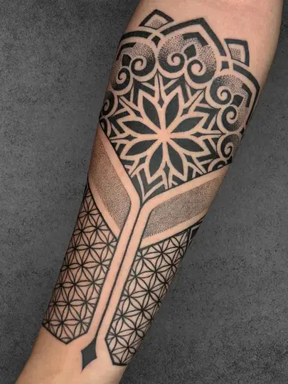 mandala and geometric patterns tattoo