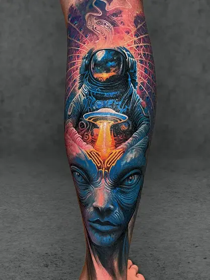 alien and astranaut colour surrealism tattoo