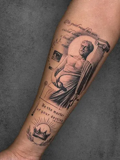A forearm tattoo featuring an ancient philosopher, complete with text and symbols like a column, eye, and crown, encouraging reflection on mastery and destiny.