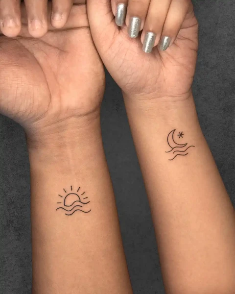 sun and moon couple tattoo