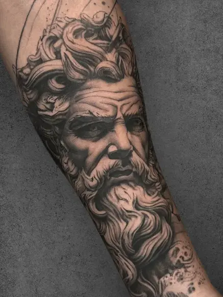 A detailed Zeus-inspired sculpture portrait with flowing beard and hair | Realistic with sculptural detailing | Forearm | Male.