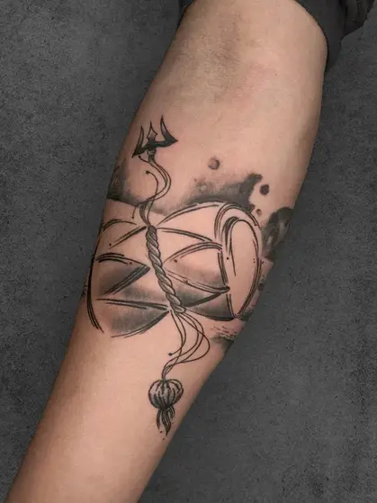 small damru tattoo