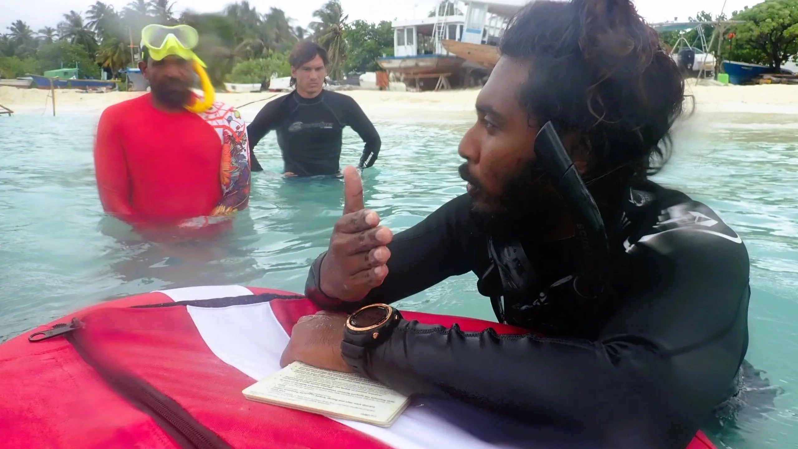 PADI Basic Freediver course participant practicing breath-hold techniques at the surface with Dive Desk Male' and the Maldivian Academy of Diving Himmafushi in the Maldives.
