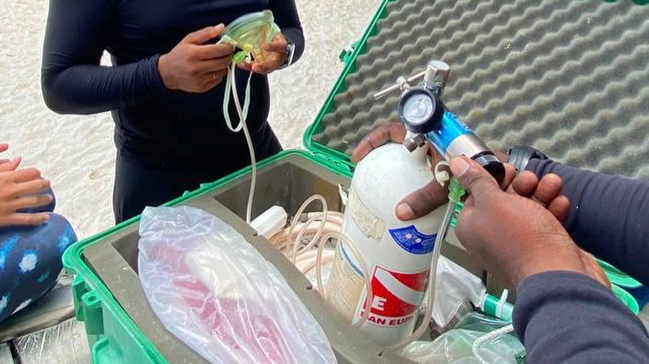 PADI Emergency Oxygen Provider course participant practicing oxygen administration with Dive Desk Male' and the Maldivian Academy of Diving Himmafushi in the Maldives.