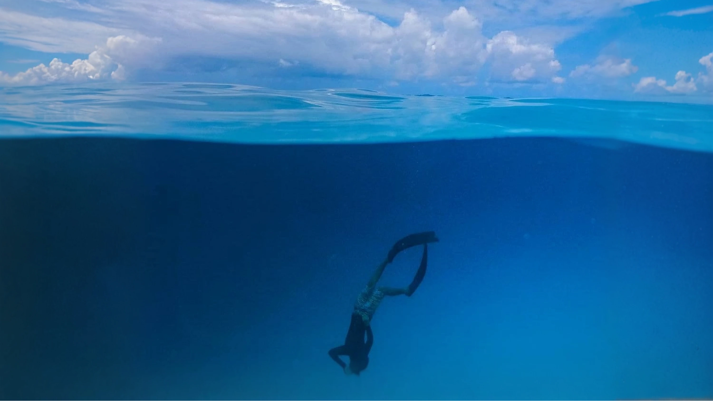 PADI Freediver course participant practicing advanced breath-hold diving techniques with Dive Desk Male' and the Maldivian Academy of Diving Himmafushi in the Maldives.