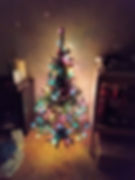 Tiny 4 foot Christmas tree in the bedroom