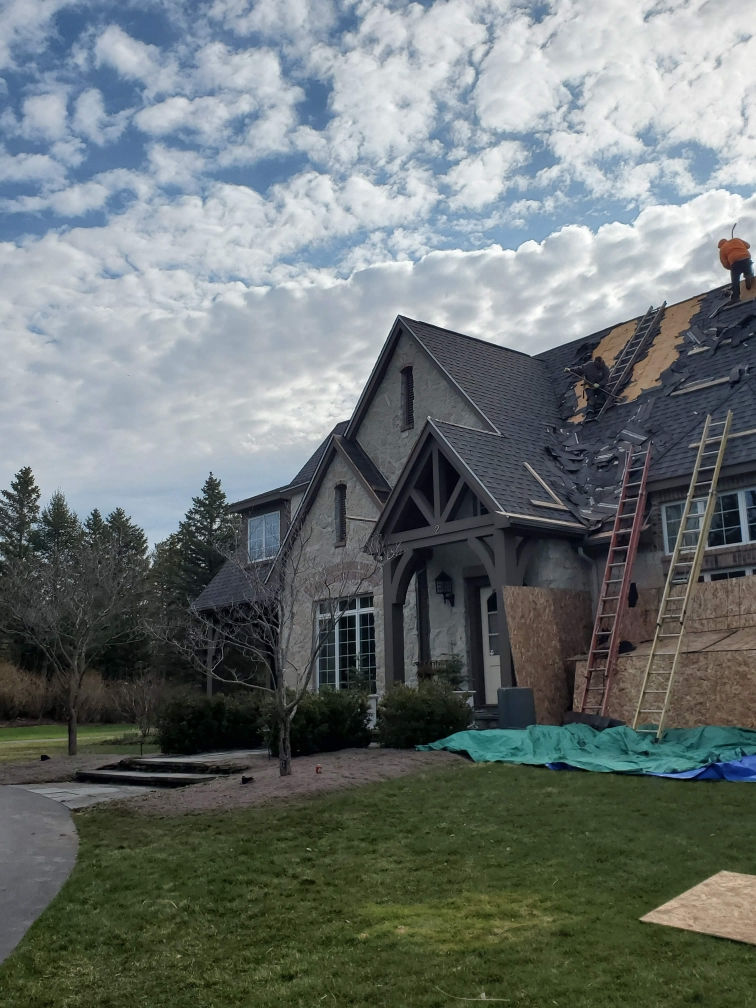 Roofing tear off job by First Choice Renovations