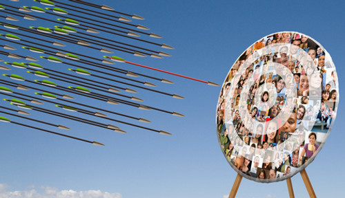 Arrows shootin towards a target audience bullseye