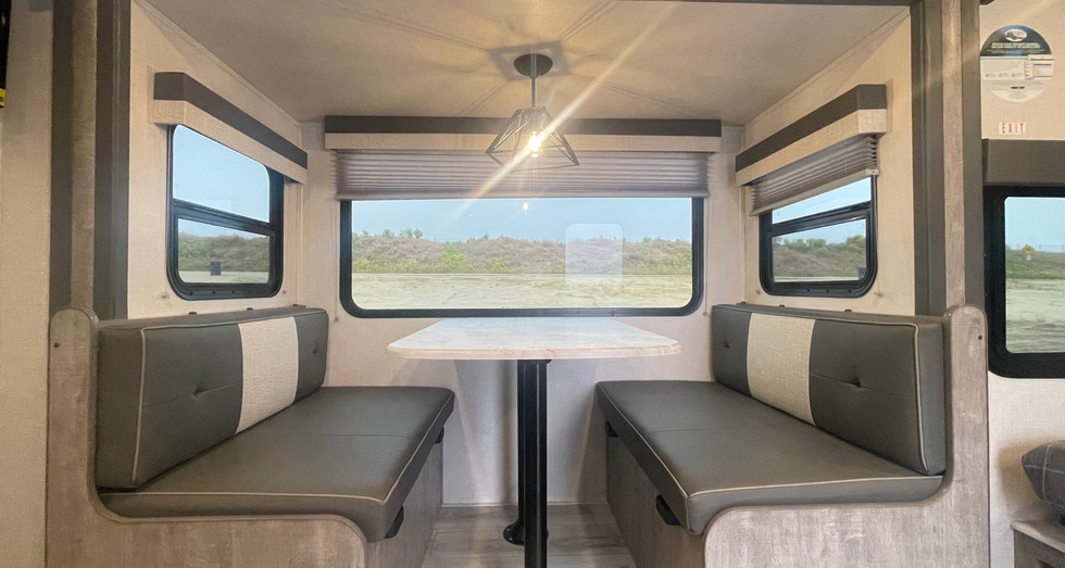 Soft LED lighting inside the Legend Brownie travel trailer, creating a warm and inviting atmosphere