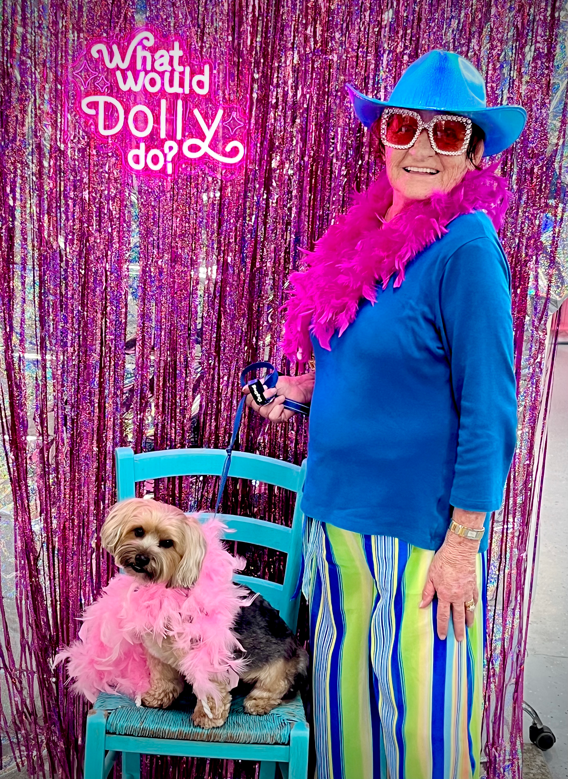 Gloria and Louie in front of the Dolly Sign