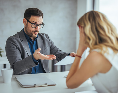 Man and woman in meeting at work