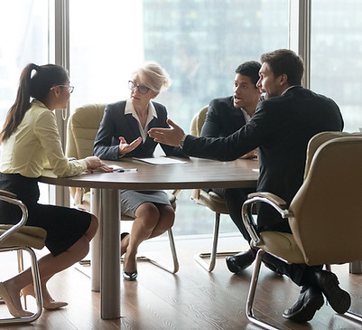 Two men and two women in a business meeting