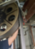 Technician upgrading elevator in Tampa commercial building