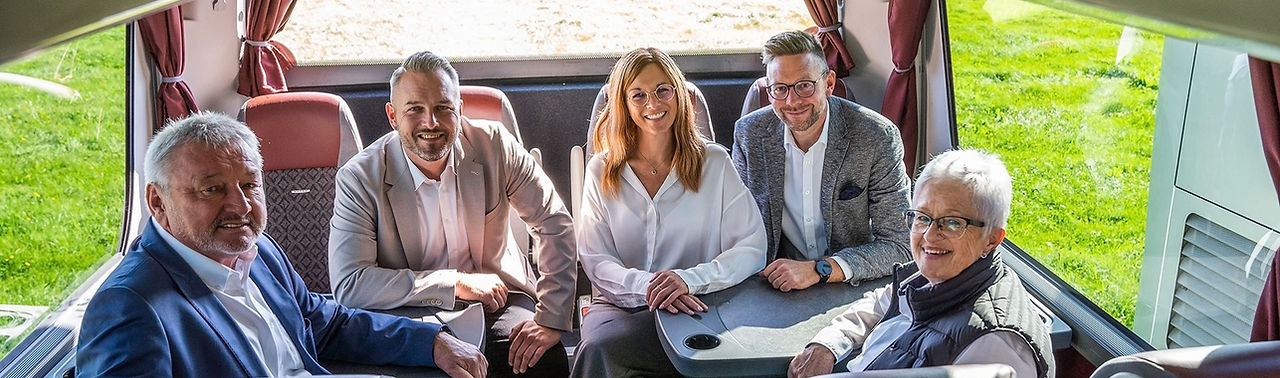 Geschäftsleitung im Bus