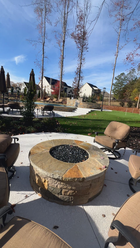 custom firepit by the pool