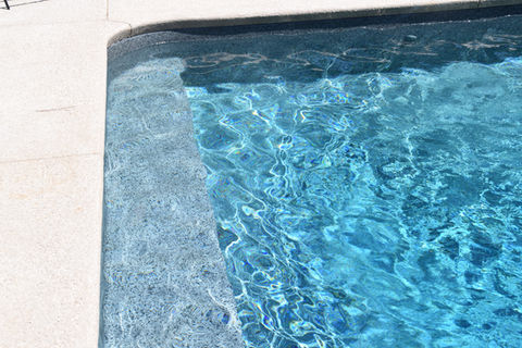 vinyl and concrete features on a custom pool