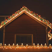 Christmas lights on a house roof.jpg