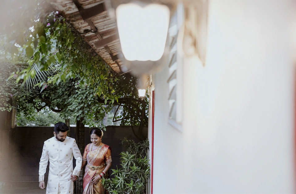 Bride and groom holding hands